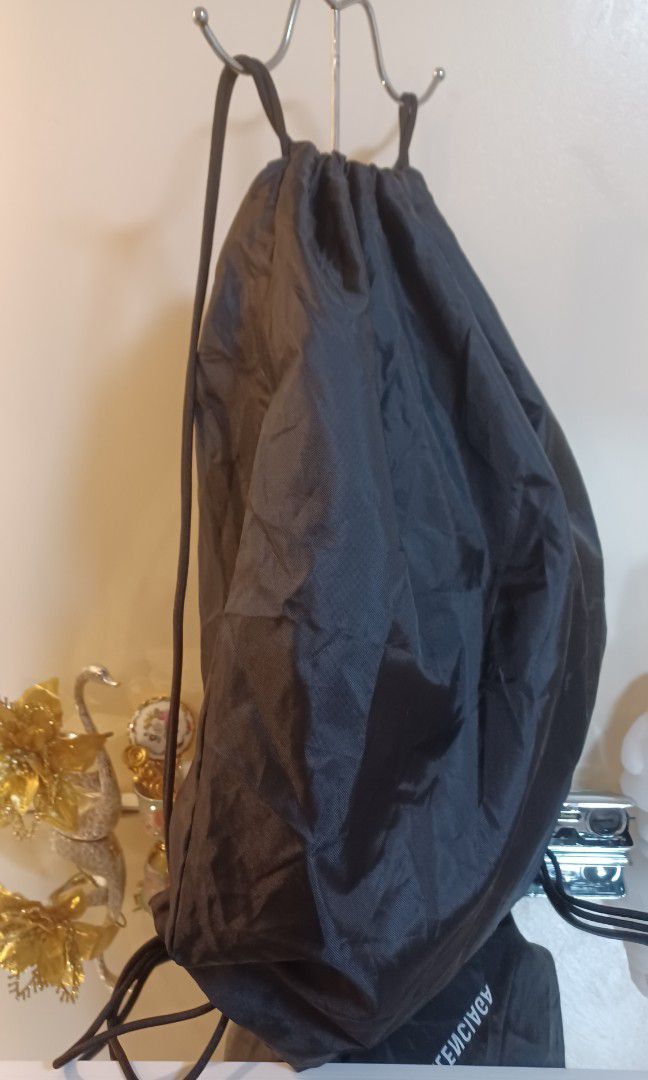 💜💕Balenciaga White Logo Drawstring Gym Sack Dustbag Backpack (Category: Luxury Bags & Wallets) located in Quezon City. Submitted by wheremyheart_is (Listing ID 1208467637, Image 3). Description: <item is available as long as posted> *auth-orig.,rare & hard to come by collector must own piece, like new con.,large-xl, approx. :19x23inches(lh),recycled polyester material making it water resistant /smudge proof, drawstring backpack,gym bag & dustba