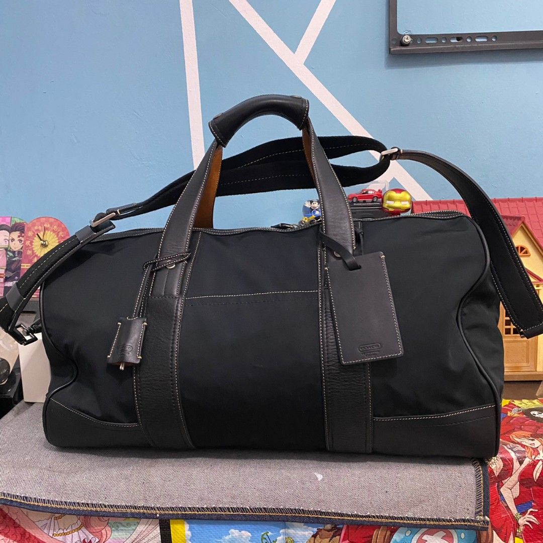 Coach duffle bag hotsell luggage