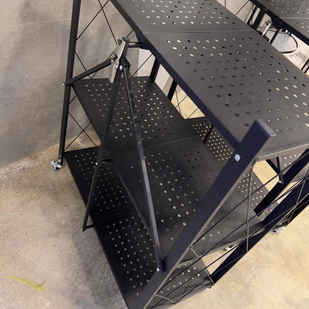 Foldable / collapsible multi purpose rack organizer with wheels / space ...