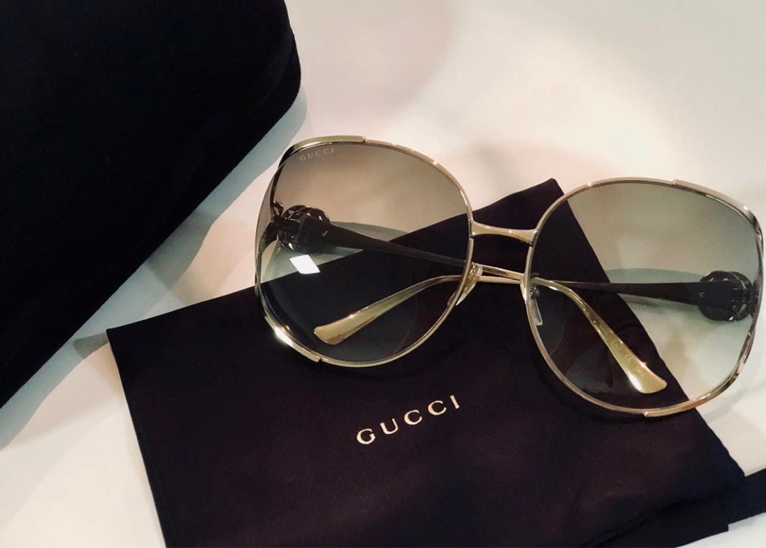gg0225s gucci