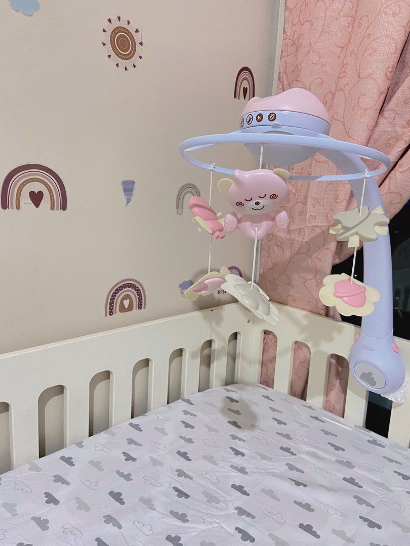 Infantino cot top mobile pink