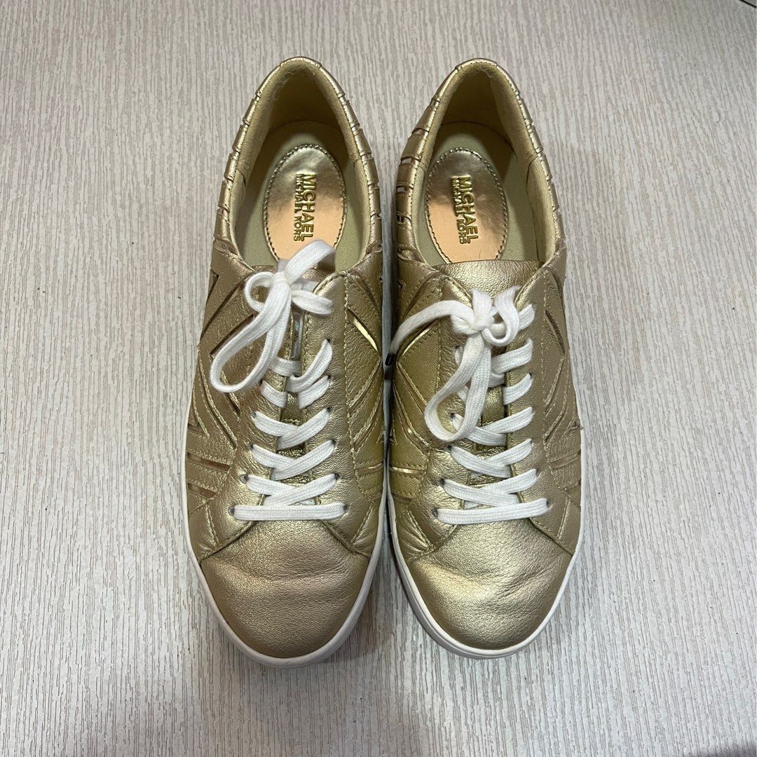 Michael kors store gold tennis shoes