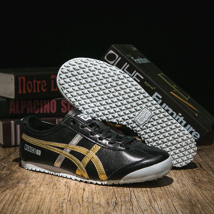 Asics tiger black and gold discount