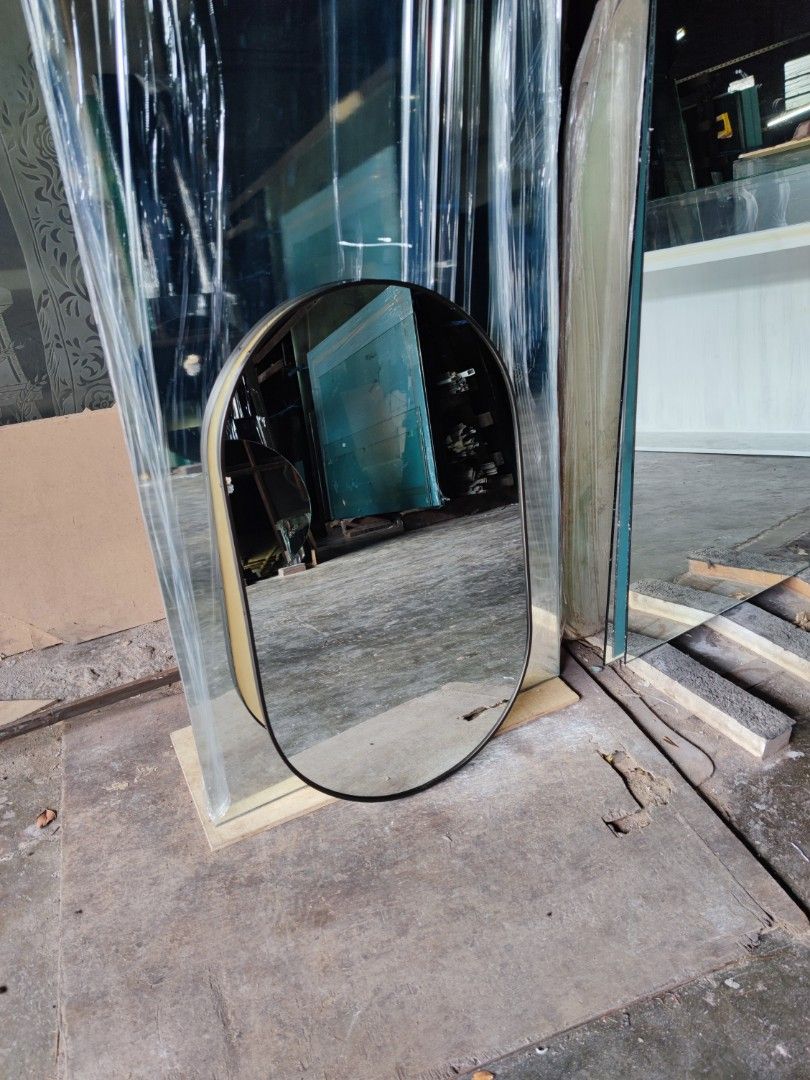 Oval Mirror (Category: Mirrors) located in Malabon City. Submitted by mirrors.ph (Listing ID 1208300288, Image 3). Description: Oval mirror with black aluminum frame and plywood backing. Using 6mm thick copper free mirror. Size: 1.5ft x 2.5ft P1012.50 Add P200 if with back hook. Available colors gold, glossy black, matte black, white and silver aluminum frame. Customize sizes and shapes are welcome..