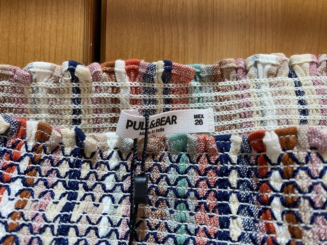 Pull & Bear Top (Category: Other Tops) located in Singapore. Submitted by simple_potato (Listing ID 1208404283, Image 2). Description: Brand new with tag and kept in storage for long time. Bought from Europe. Measurements as shown in pictures. Self collect at Farrer Park MRT..