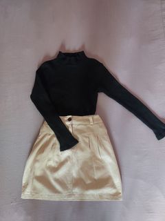 black turtleneck top & cream skirt