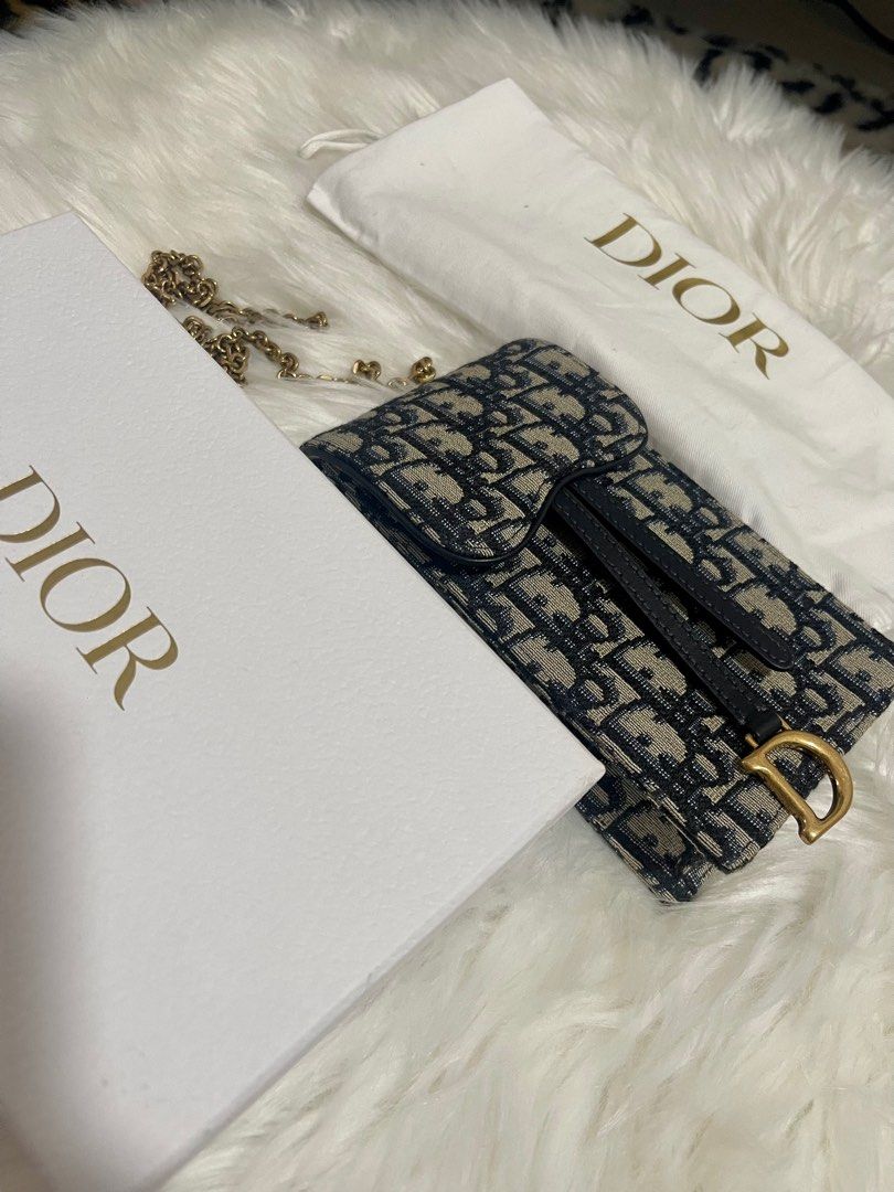 Dior Vertical saddle pouch, Luxury, Bags & Wallets on Carousell