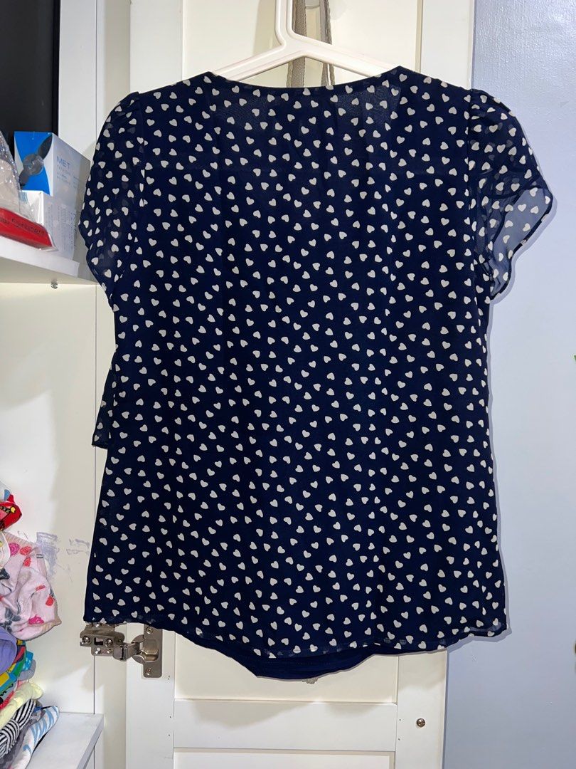 Iora Hearts Chiffon Blouse (Navy Blue) (Category: Blouses) located in Quezon City. Submitted by tinsey (Listing ID 1208601174, Image 2). Description: Non-stretch fabric With inner lining Scallop sleeves Size details Bust 32-34in Waist 28in Add Php150 for lbc shipping within Metro Manila GrabExpress delivery also an option .