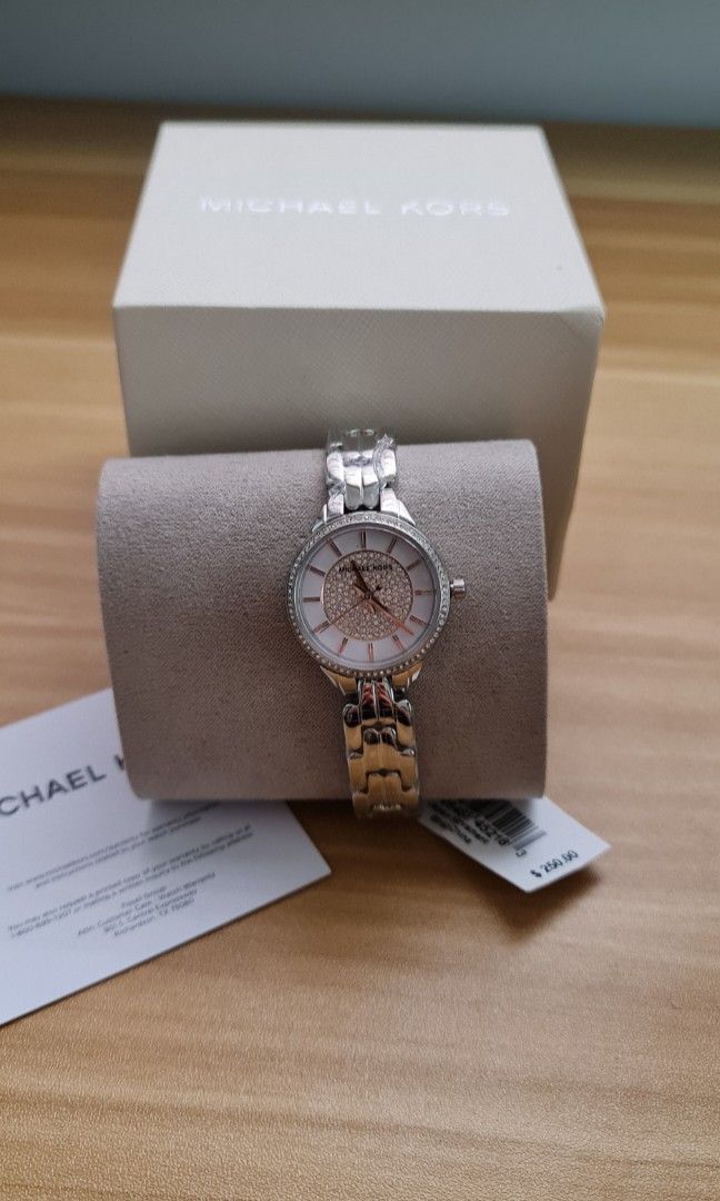 How to authenticate michael kors watch clearance