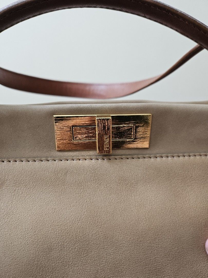 Fendi Peekaboo (Category: Luxury Bags & Wallets) located in Manila. Submitted by shoppingspree008 (Listing ID 1257709525, Image 2). Description: well loved fendi peekaboo in large. super rare combo with denim lining..