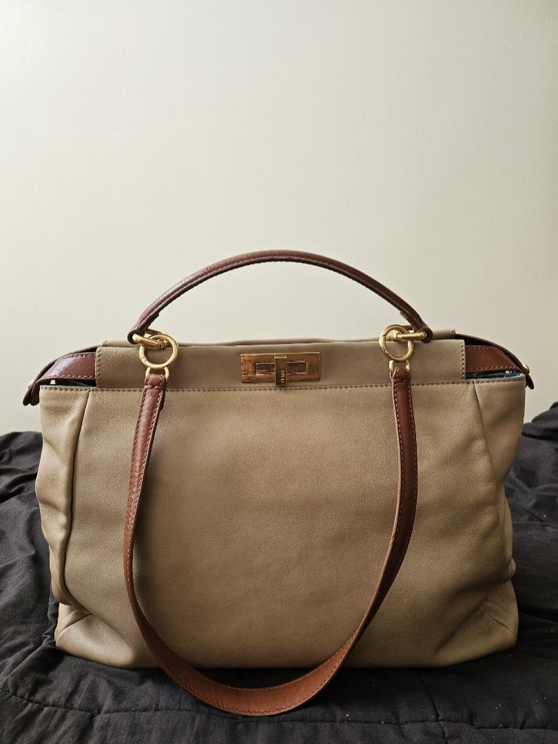 Fendi Peekaboo (Category: Luxury Bags & Wallets) located in Manila. Submitted by shoppingspree008 (Listing ID 1257709525, Image 1). Description: well loved fendi peekaboo in large. super rare combo with denim lining..