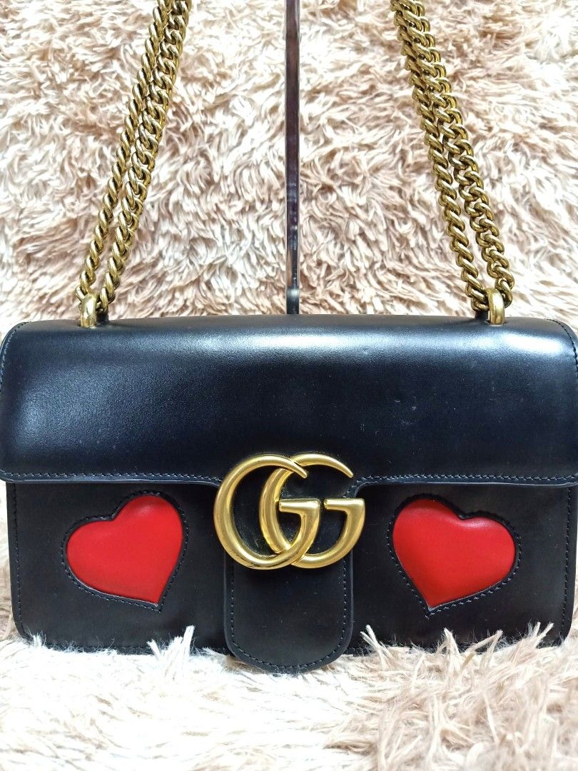Gucci bag best sale with heart logo