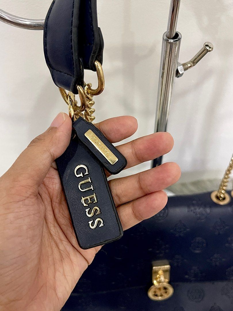 Guess MPO (Category: Cross-body Bags) located in Manila. Submitted by wellnessessentials (Listing ID 1257836402, Image 2). Description: Own preloved Direct Message 💌 Courier 🚚 Jnt.
