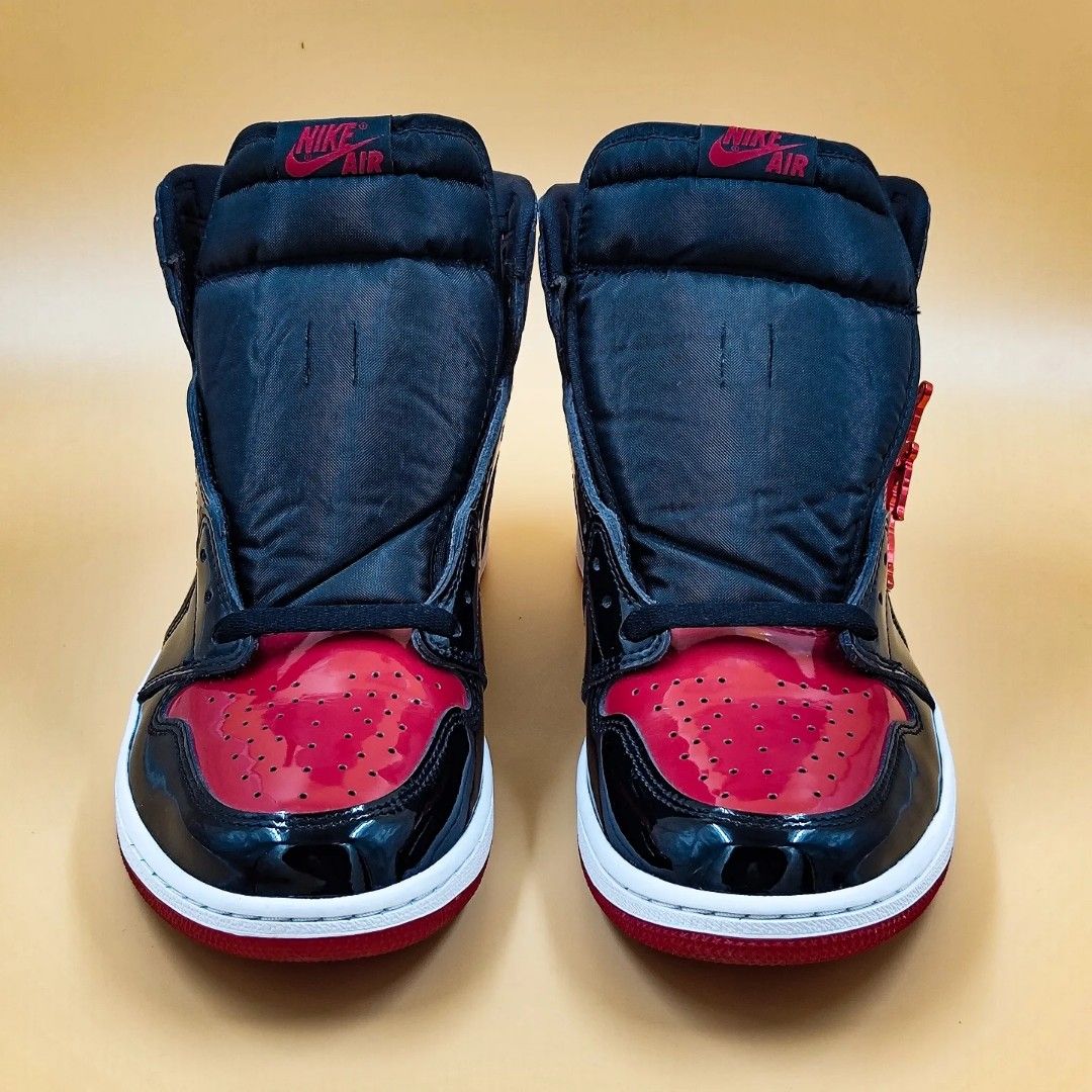 Jordan 1 Retro High OG 'Patent Bred' (Category: Sneakers) located in Imus. Submitted by jaeck07 (Listing ID 1255688994, Image 2). Description: - 9.5+/10 condition, PADS - Complete with OG box, extra laces, and jumpman hang tag WE SHIP NATIONWIDE 📦 COD/COP.