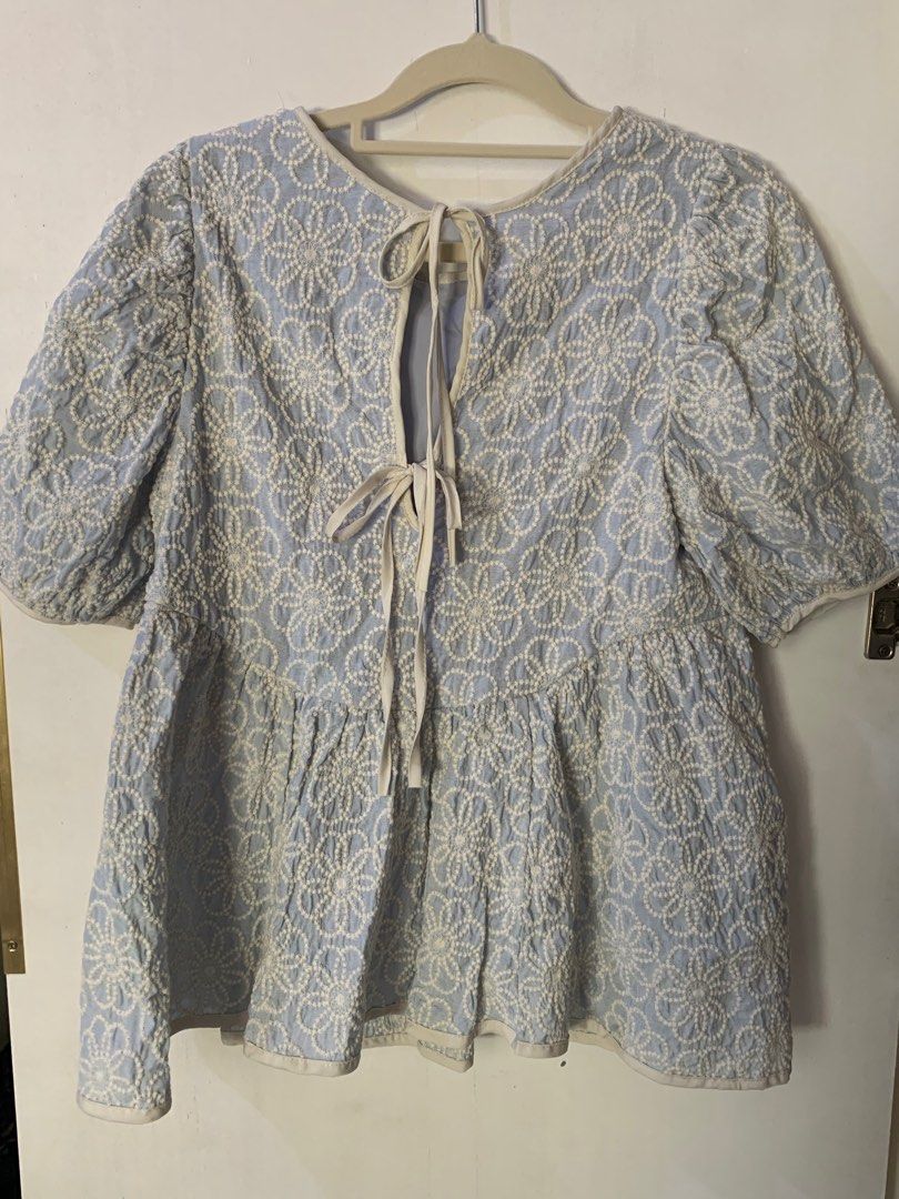 Korean peplum embroidered top (Category: Blouses) located in San Fernando. Submitted by project.cleanup (Listing ID 1257734595, Image 2). Description: I’m size med-large and it fits me well on all parts except bust huhu So pretty the back tie details super in ang ganito ngayon kya napabili 😅.