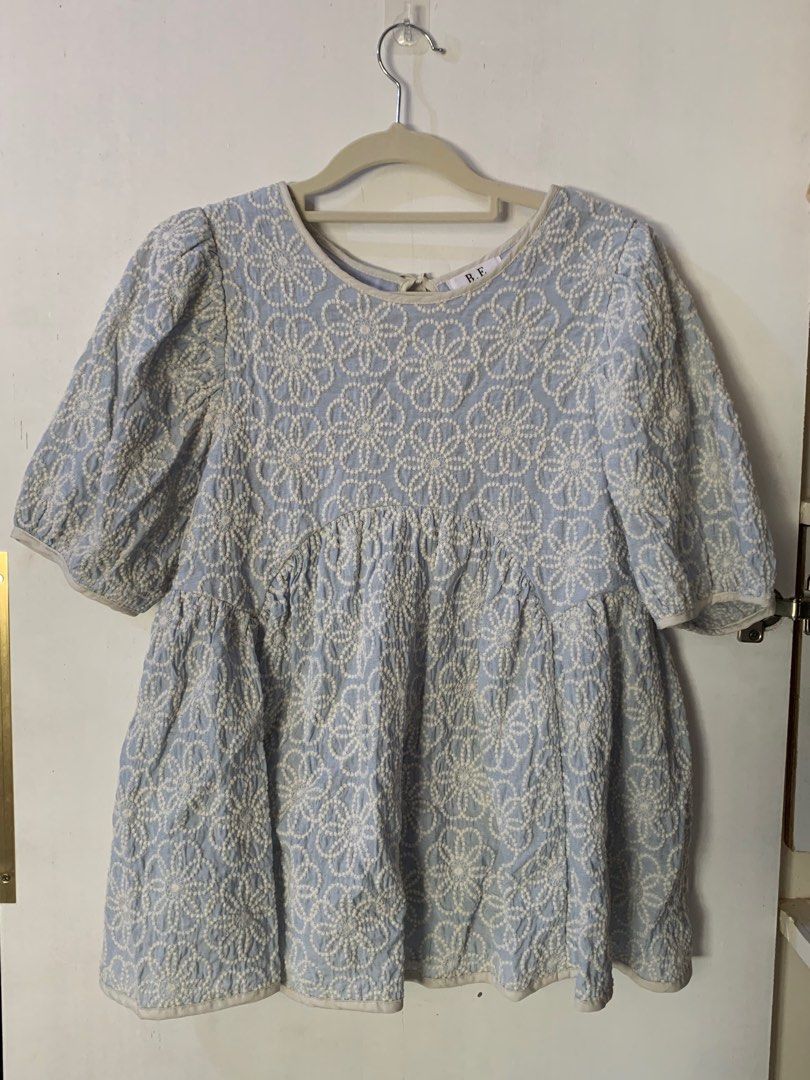 Korean peplum embroidered top (Category: Blouses) located in San Fernando. Submitted by project.cleanup (Listing ID 1257734595, Image 1). Description: I’m size med-large and it fits me well on all parts except bust huhu So pretty the back tie details super in ang ganito ngayon kya napabili 😅.