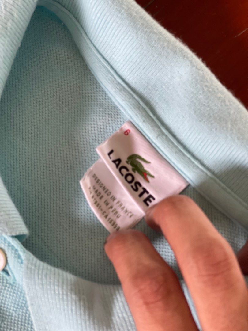 Lacoste polo tag hot sale