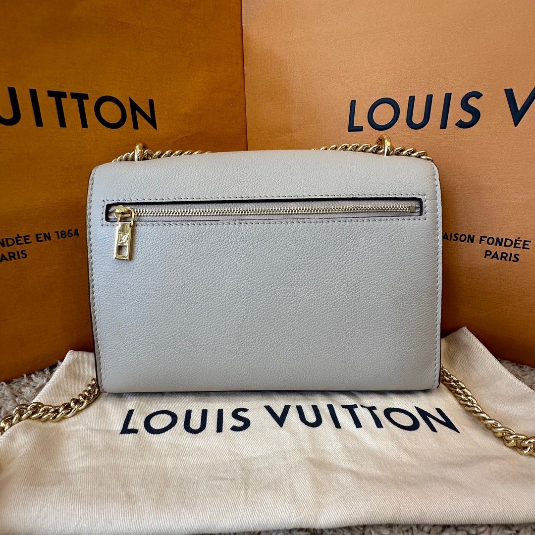 Louis Vuitton MyLockMe Chain Bag Greige Calfskin, Luxury, Bags & Wallets on  Carousell