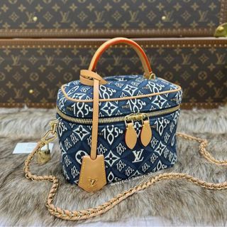 Louis Vuitton Irene Handbag Monogram Embossed Suede and Patent
