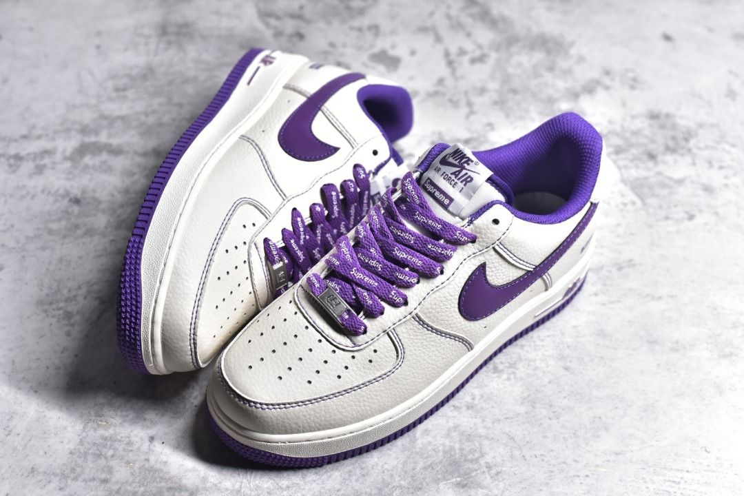 Purple white nike hotsell shoes