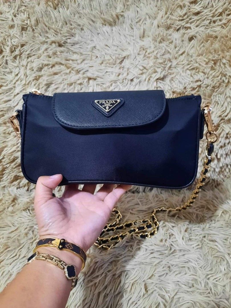No flaws Silver Hardware Prada wd coin purse, Women's Fashion, Bags &  Wallets, Cross-body Bags on Carousell