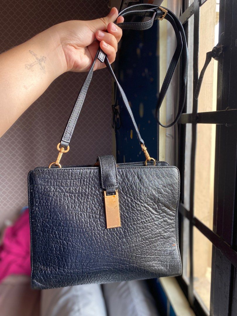 Authentic COURONNE small slingbag (Category: Luxury Bags & Wallets) located in Bulacan. Submitted by thriftyhaven2023 (Listing ID 1259340063, Image 2). Description: With normal signs of usage only.