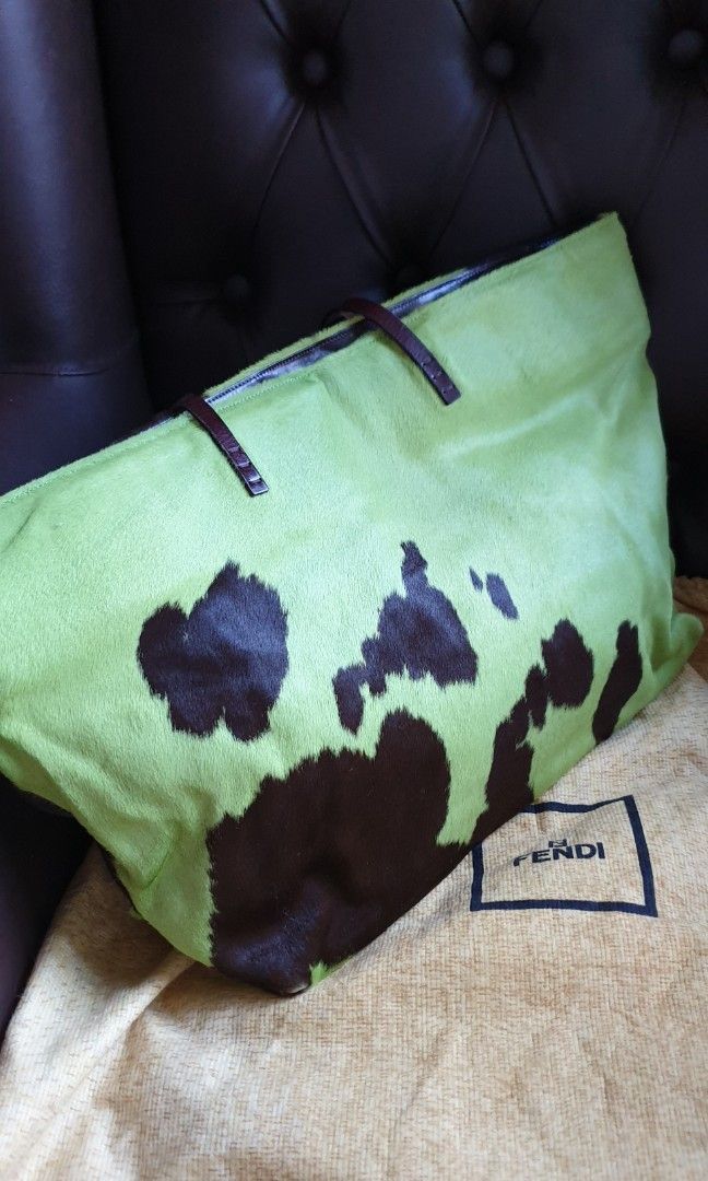 Authentic vintage Fendi fur bag (Category: Luxury Bags & Wallets) located in Pasig City. Submitted by authentic_shopaholic_manila (Listing ID 1259384918, Image 2). Description: well used Fendi fur bag. with original dustbag. leather handles Like us on FB: AUTHENTIC SHOPAHOLIC MANILA (Since 2013).