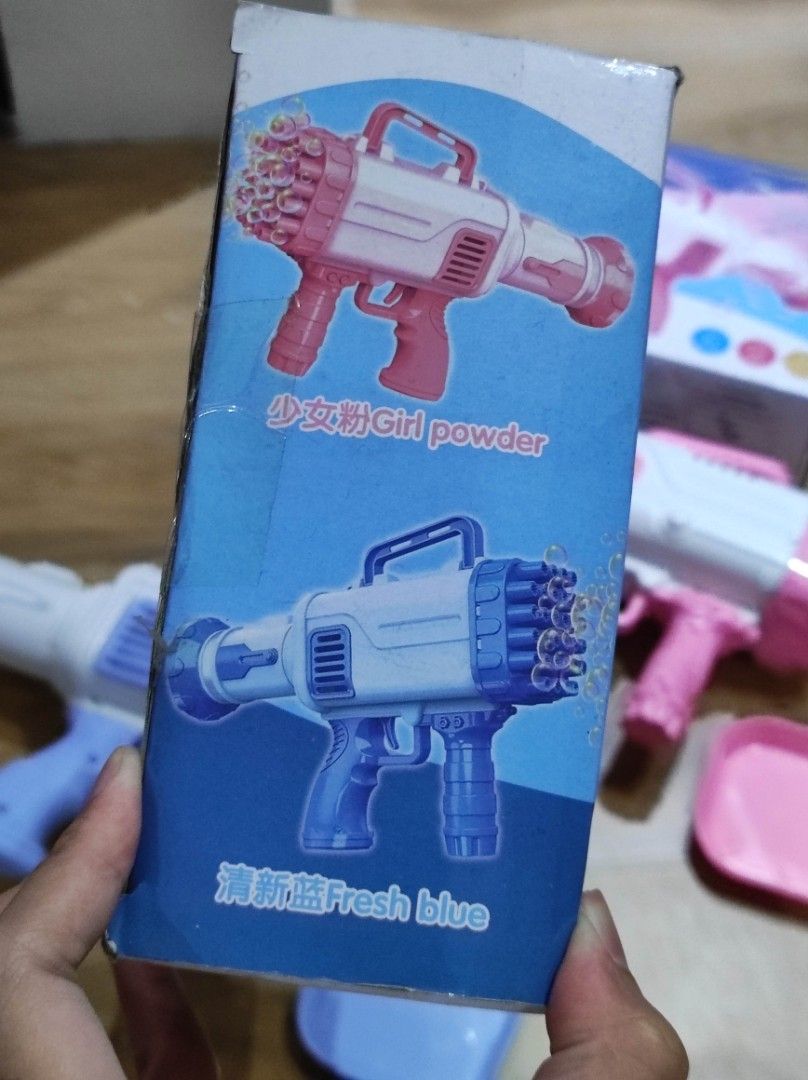 BUBBLE MAKER Bazooka Gun (Category: Action & Battle Toys) located in Quezon City. Submitted by pauleenvenus (Listing ID 1259295247, Image 3). Description: available in PINK and BLUE only PHP 200 EACH with bubble liquid tray LOC: HOLY SPIRIT QC.