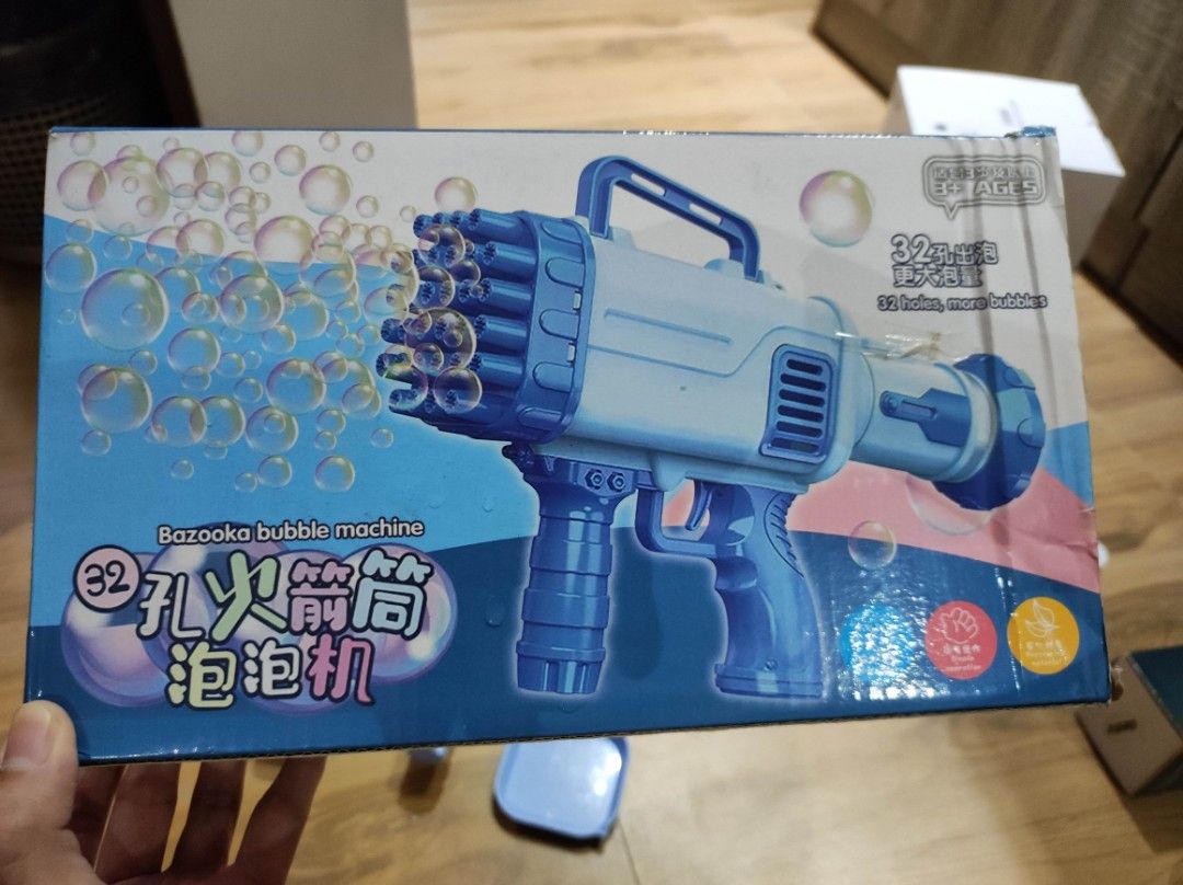 BUBBLE MAKER Bazooka Gun (Category: Action & Battle Toys) located in Quezon City. Submitted by pauleenvenus (Listing ID 1259295247, Image 2). Description: available in PINK and BLUE only PHP 200 EACH with bubble liquid tray LOC: HOLY SPIRIT QC.