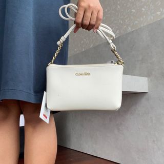 Calvin Klein White Cross-Body Bag, Women's Fashion, Bags & Wallets, Cross-body  Bags on Carousell