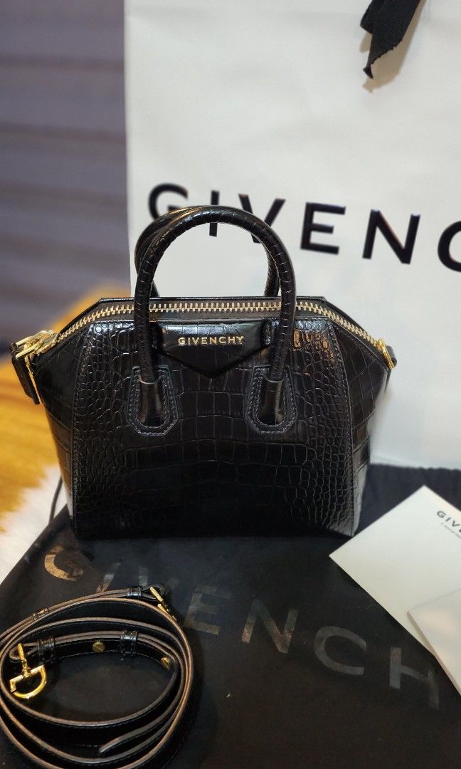 Givenchy Calfskin Crocodile Embossed Mini Antigona Black (Category: Luxury Bags & Wallets) located in Daet. Submitted by BagMom (Listing ID 1259298005, Image 2). Description: Givenchy Calfskin Crocodile Embossed Mini Antigona Black 👉excellent condition 👉With dust bag, paper bag, receipts, cards and strap 👉Swipe for detailed pics 👉cash only/layaway 👉PM or viber/WhatApp(09189599588) for details Disclaimer: BagMom is not associated with the bra