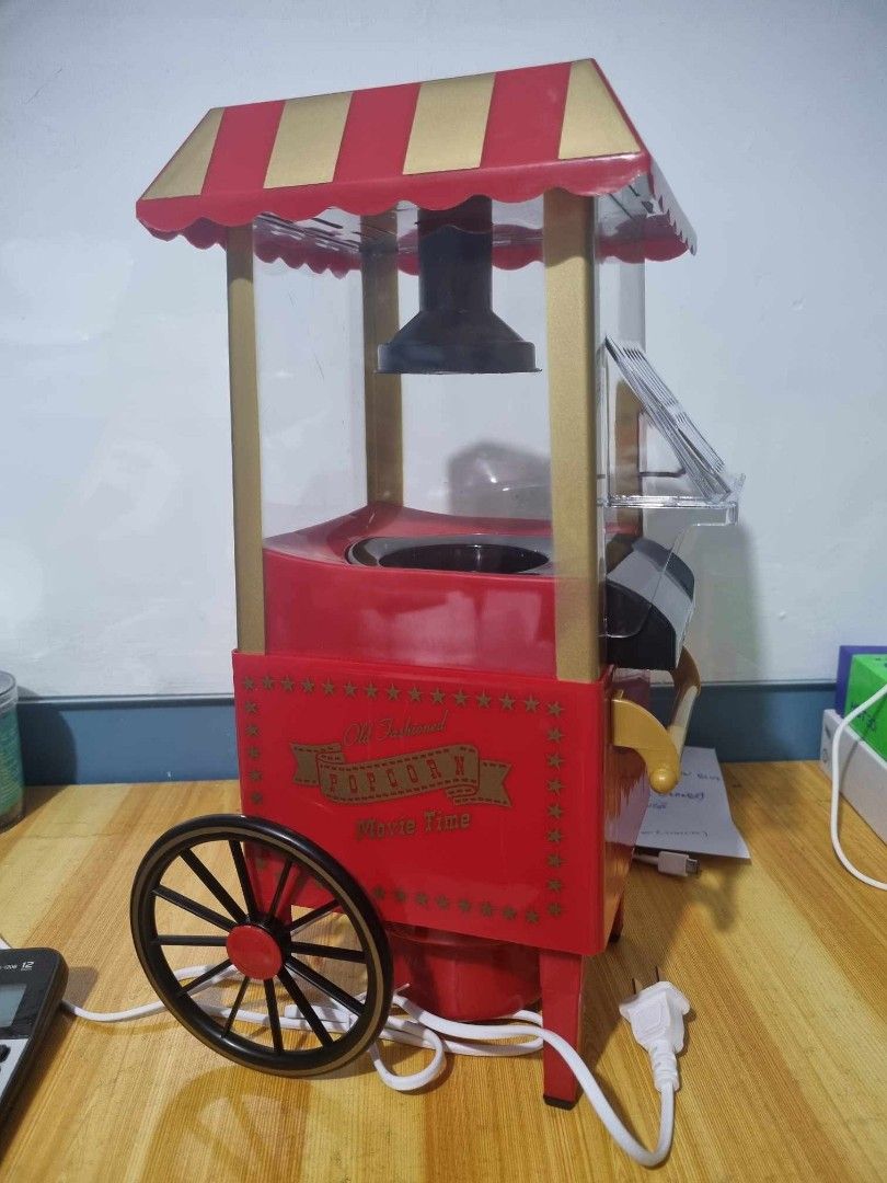 Popcorn Maker (Category: Other Kitchen Appliances) located in Manila. Submitted by redonlineshop (Listing ID 1259434200, Image 2). Description: Popcorn Maker ₱1050 Material: Plastic Size: 41cm x 25cm x 22cm Electric air-pop type popcorn maker Makes oil-free popcorn in 5 mins Space-saving and portable design ON HAND BRAND NEW Mode of Payment: Gcash,COD Same day delivery + Delivery Fee.