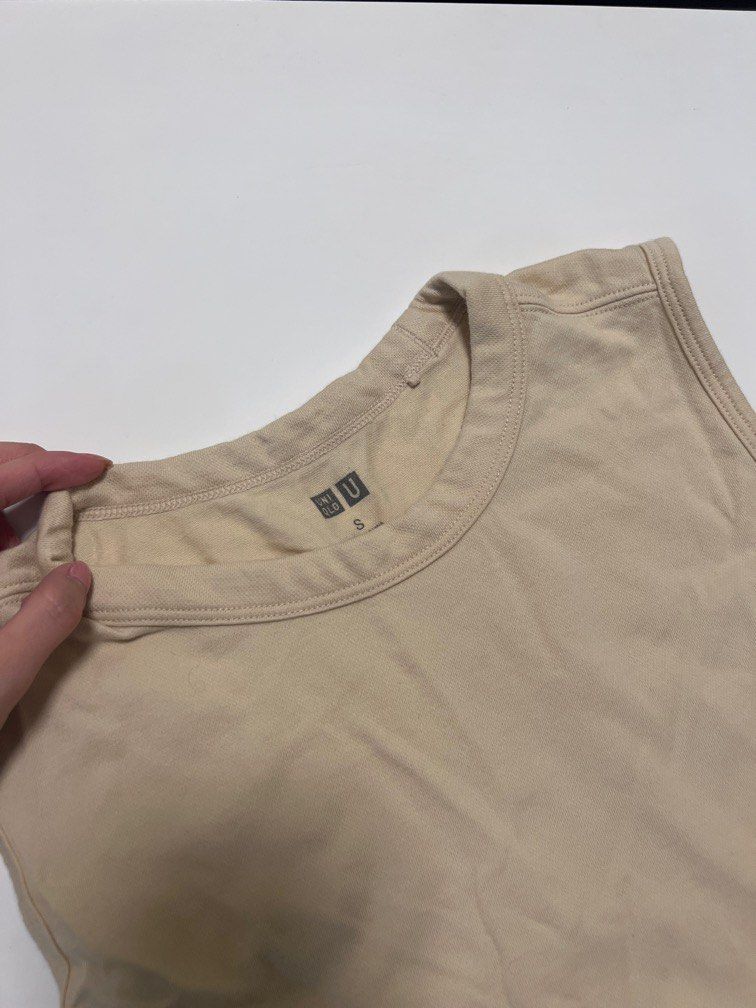 Small Beige Uniqlo Muscle womens tee (Category: Sleeveless) located in Makati City. Submitted by inthemoodforstuff (Listing ID 1259339971, Image 2). Description: -super comfy for casual days -used thrice only Rfs: doesnt fit me anymore😭 • Shipping via courier pick up in makati only. Grab or lalamove -Payment via Gcash only💕.