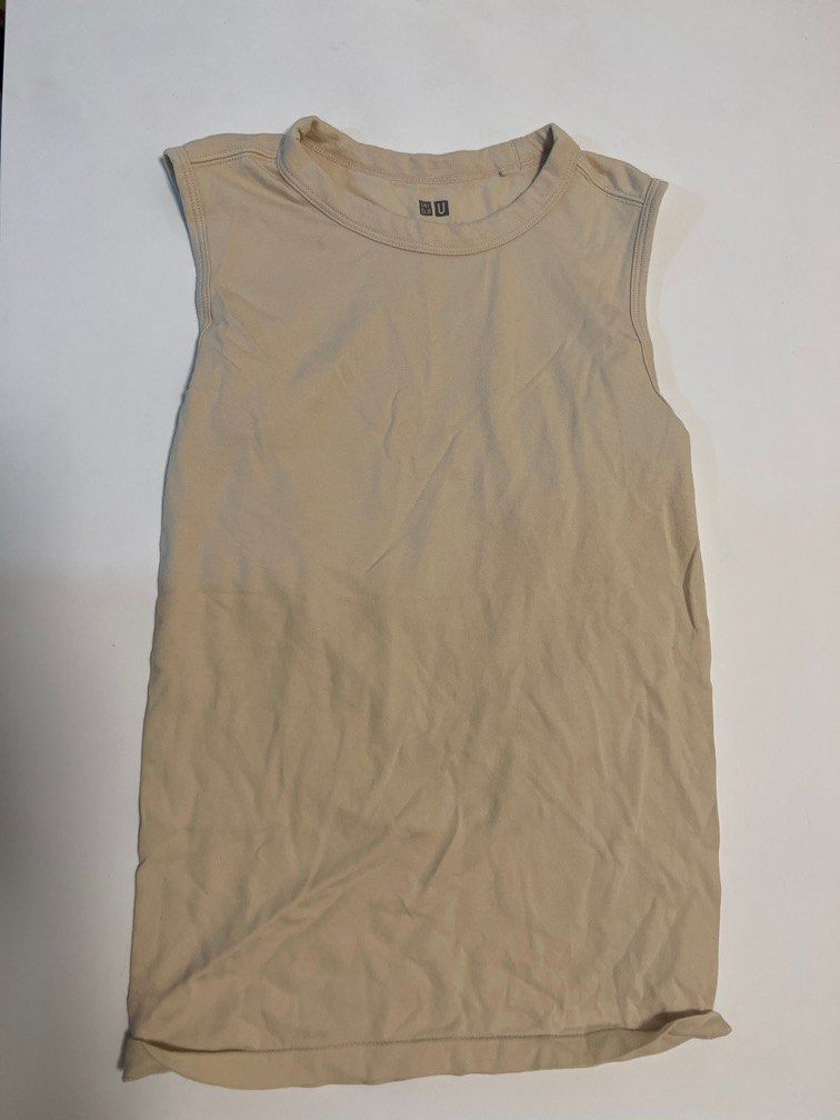Small Beige Uniqlo Muscle womens tee (Category: Sleeveless) located in Makati City. Submitted by inthemoodforstuff (Listing ID 1259339971, Image 1). Description: -super comfy for casual days -used thrice only Rfs: doesnt fit me anymore😭 • Shipping via courier pick up in makati only. Grab or lalamove -Payment via Gcash only💕.