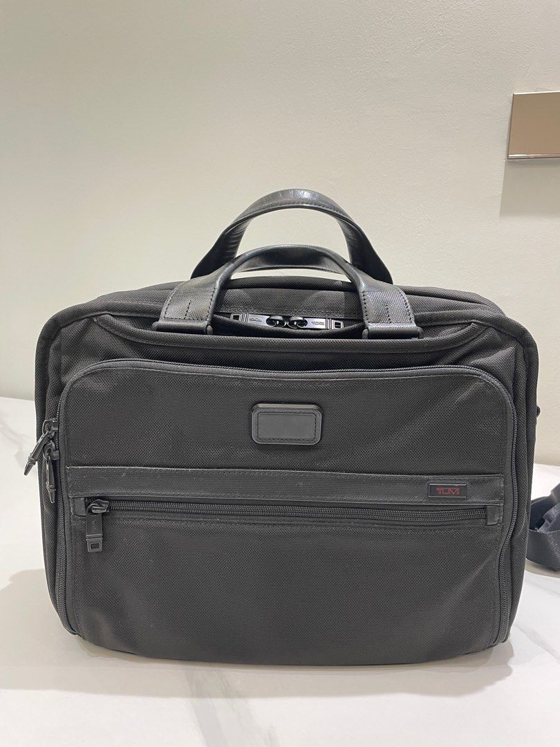 Tumi triple compartment deals brief review