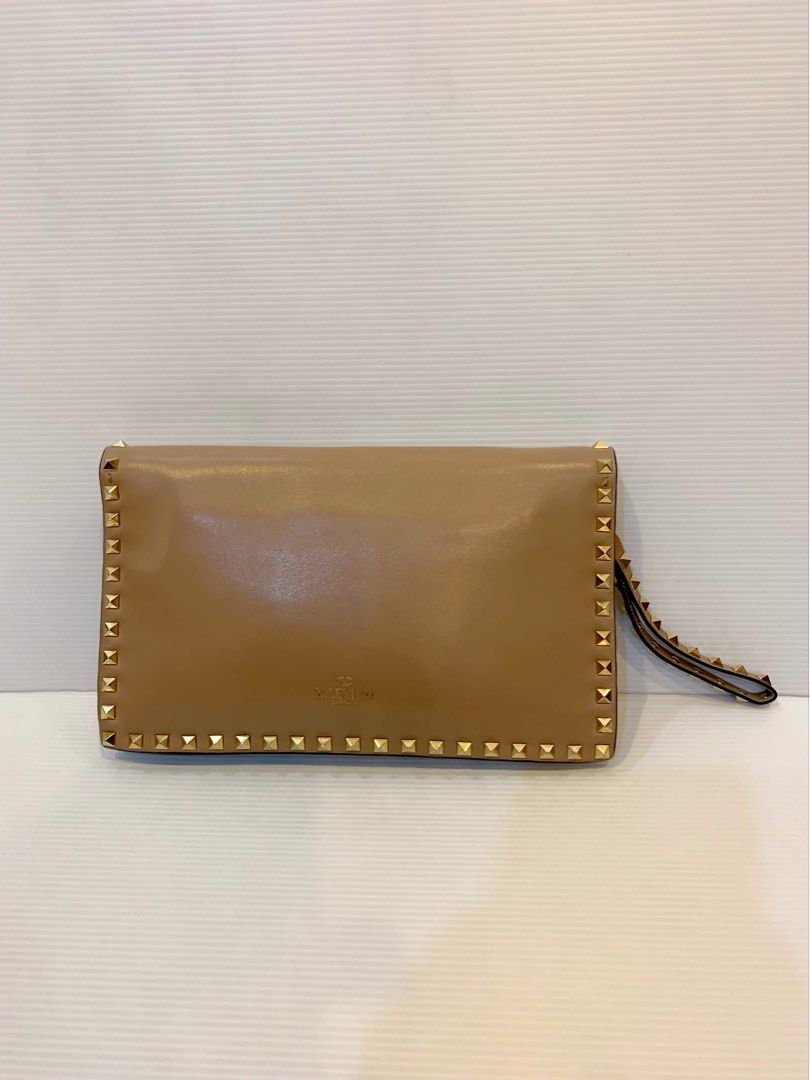 Gold valentino clutch bag top