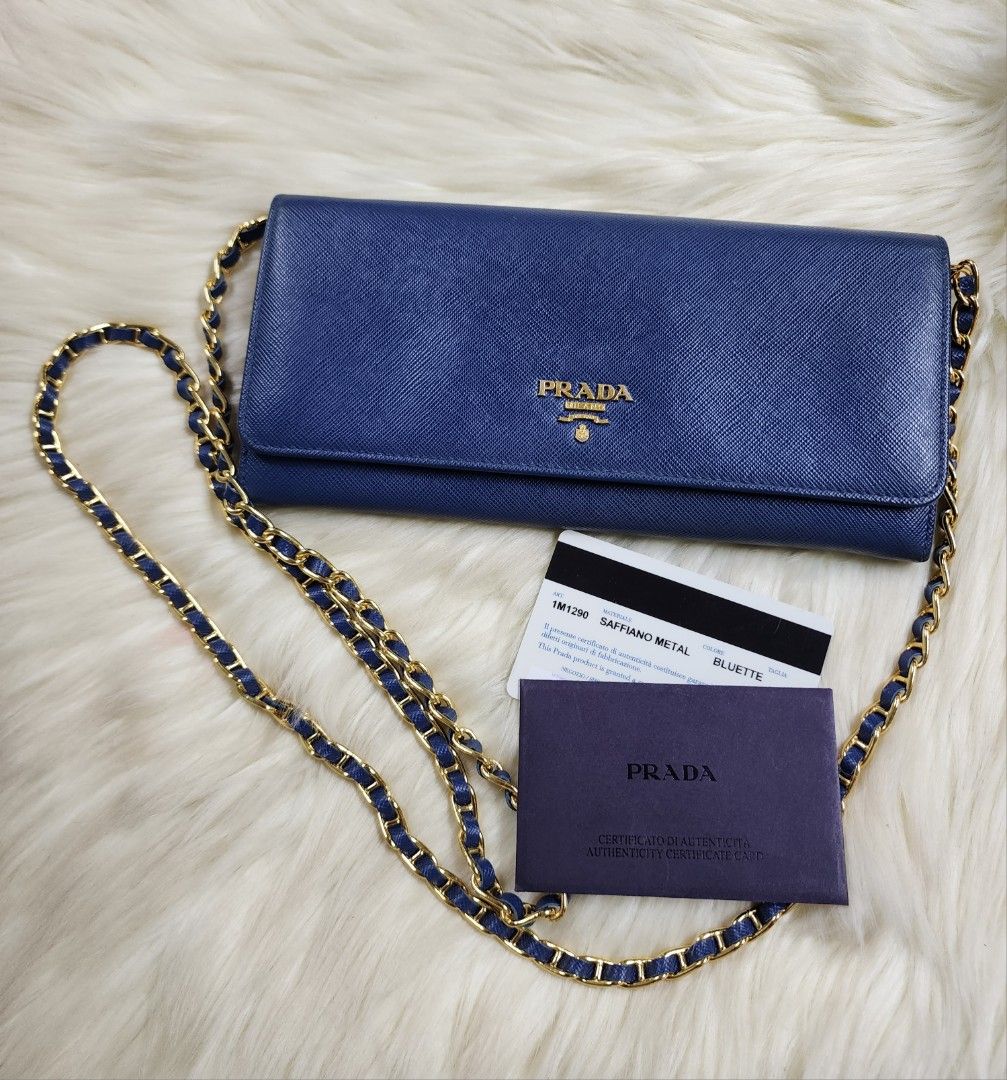 Authentic Prada Saffiano WOC in Bluette, Luxury, Bags & Wallets on Carousell