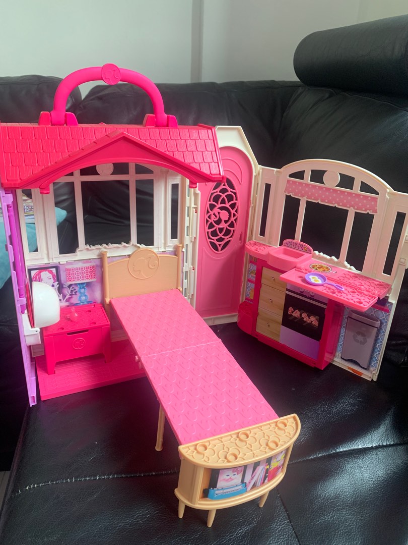 Barbie carry away doll house