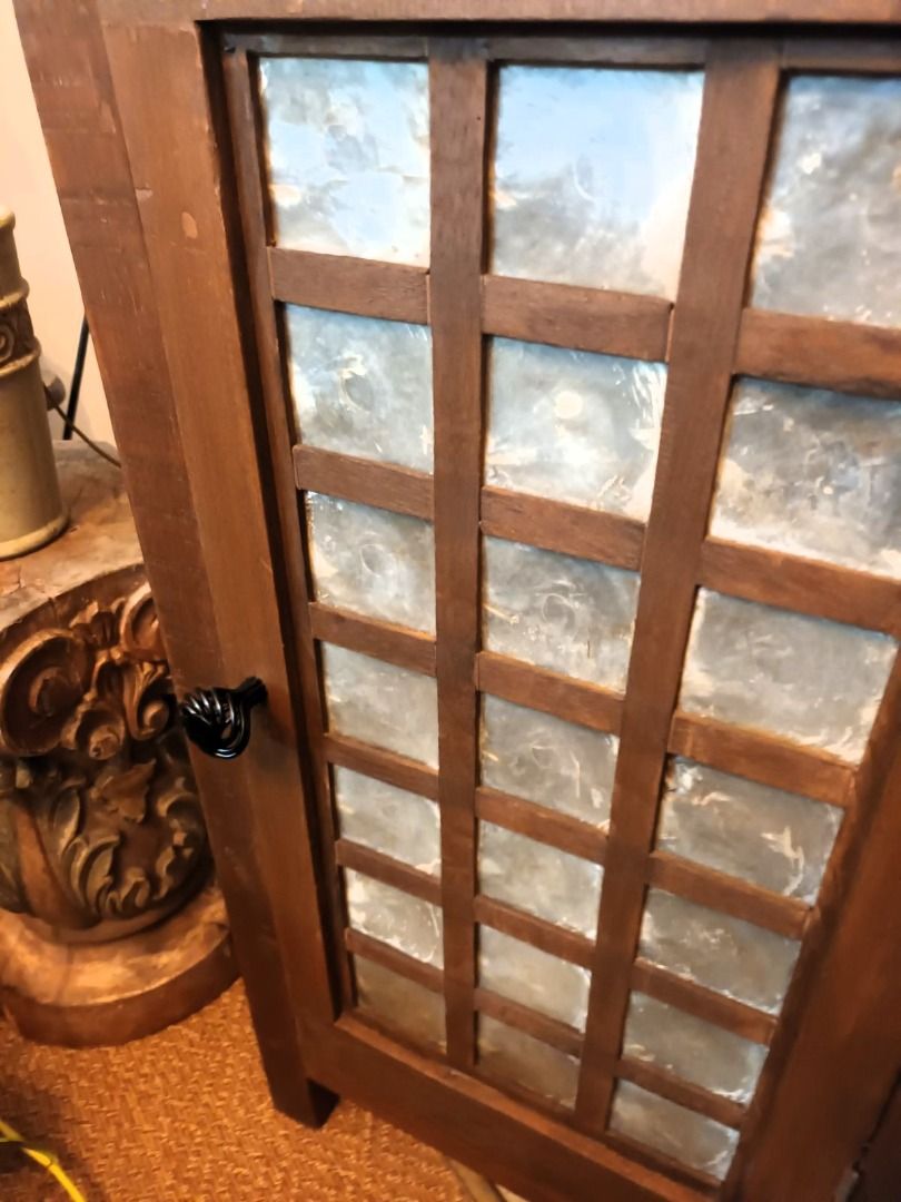 Beautiful shelf with capiz door made from old capiz window and