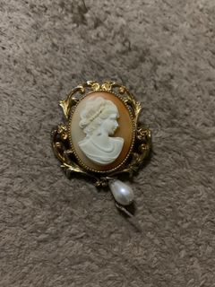 Cameo brooch with faux pearl.  Made in japan samped