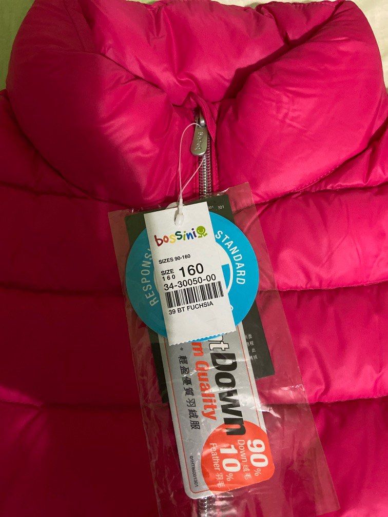 Down jacket (Category: Babies & Kids Fashion) located in Singapore. Submitted by springong (Listing ID 1259492890, Image 2). Description: Bossini Size 160 Fuchsia colour 90% down Jacket is light weight n of premium quality can fold into attached pouch. 2 side pocket, 2 inner side pocket with 1 name tag Under the light, you can see the jacket is filled with down evenly spread out total 72g. Quality zip with inner flap to protect getting your other