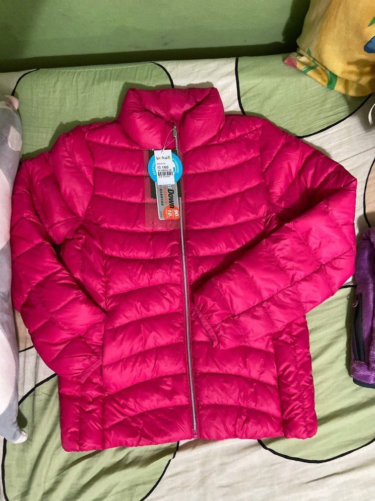 Down jacket (Category: Babies & Kids Fashion) located in Singapore. Submitted by springong (Listing ID 1259492890, Image 1). Description: Bossini Size 160 Fuchsia colour 90% down Jacket is light weight n of premium quality can fold into attached pouch. 2 side pocket, 2 inner side pocket with 1 name tag Under the light, you can see the jacket is filled with down evenly spread out total 72g. Quality zip with inner flap to protect getting your other