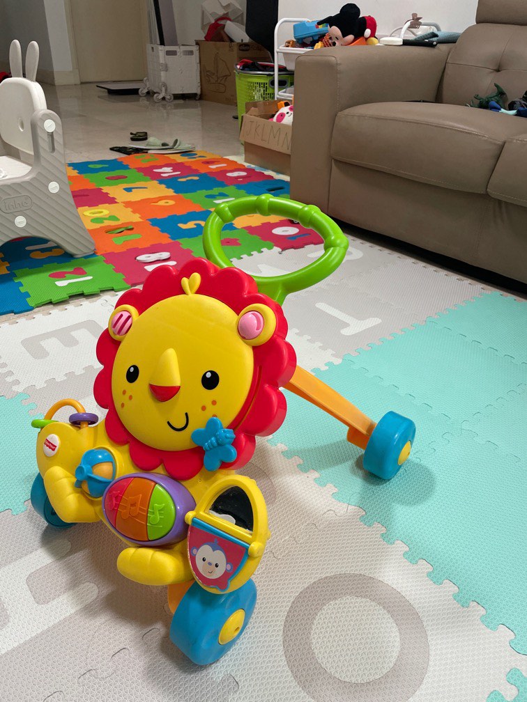 Harga fisher price musical lion walker top