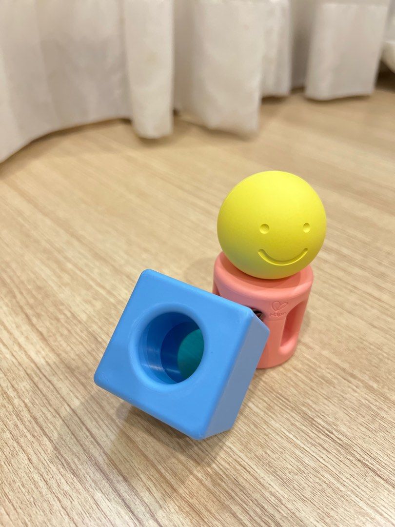 Hape geometric rattle trio top