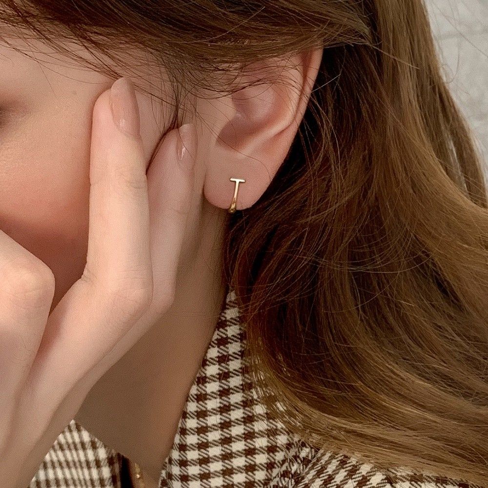 Gold top clasp earrings