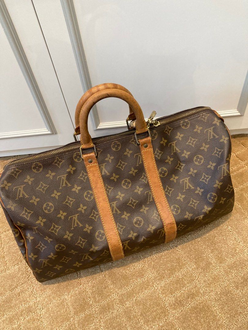 Lot - Louis Vuitton Monogram Keepall 55 Bag, Length of zipper
