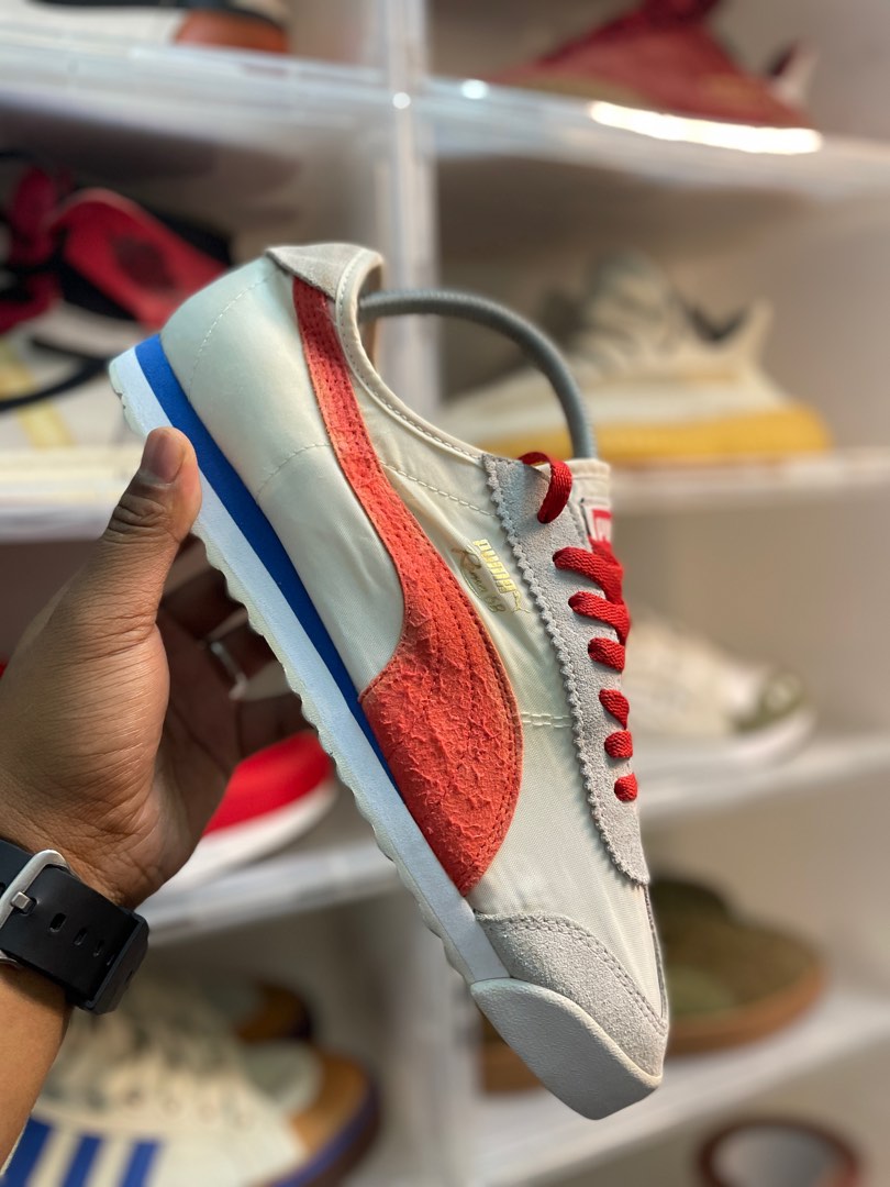 Adidas samoa deals vs puma roma