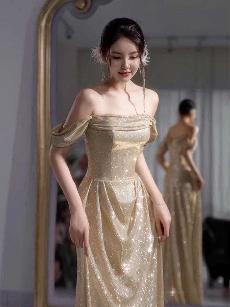 Gold party top gown