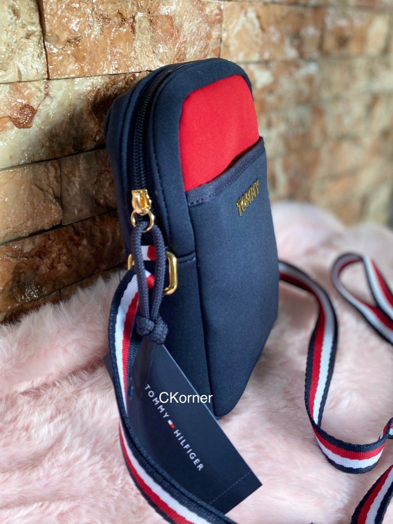 Tommy Hilfiger Sling / Crossbody Bag (Category: Cross-body Bags) located in Lipa City. Submitted by _flor_ (Listing ID 1259604471, Image 2). Description: Tommy Hilfiger Sling / Crossbody Bag Onhand, ready to ship 100% Authentic from US Actual measurement indicated on photo Php 2,400 plus sf Location: Lipa City Courier: LbC **Item’s color may slightly vary due to lighting sources and/or your screen settings ** Please allow 0.5-1 inch measurement e
