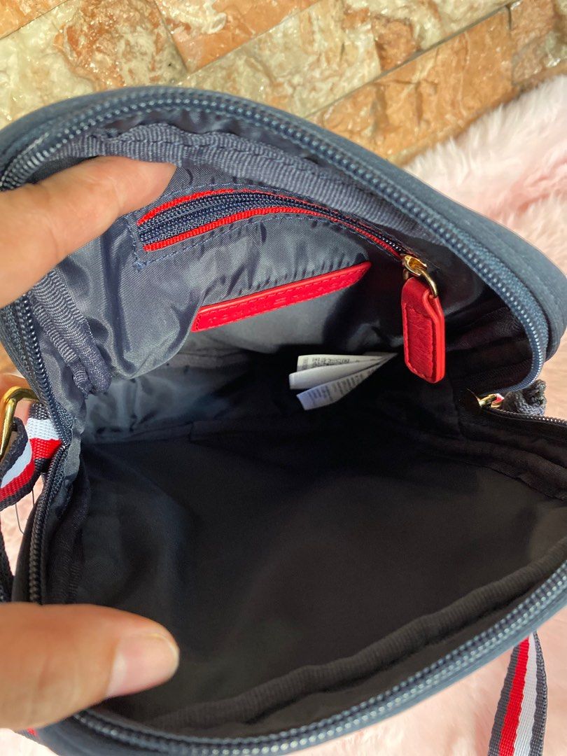 Tommy Hilfiger Sling / Crossbody Bag (Category: Cross-body Bags) located in Lipa City. Submitted by _flor_ (Listing ID 1259604471, Image 3). Description: Tommy Hilfiger Sling / Crossbody Bag Onhand, ready to ship 100% Authentic from US Actual measurement indicated on photo Php 2,400 plus sf Location: Lipa City Courier: LbC **Item’s color may slightly vary due to lighting sources and/or your screen settings ** Please allow 0.5-1 inch measurement e